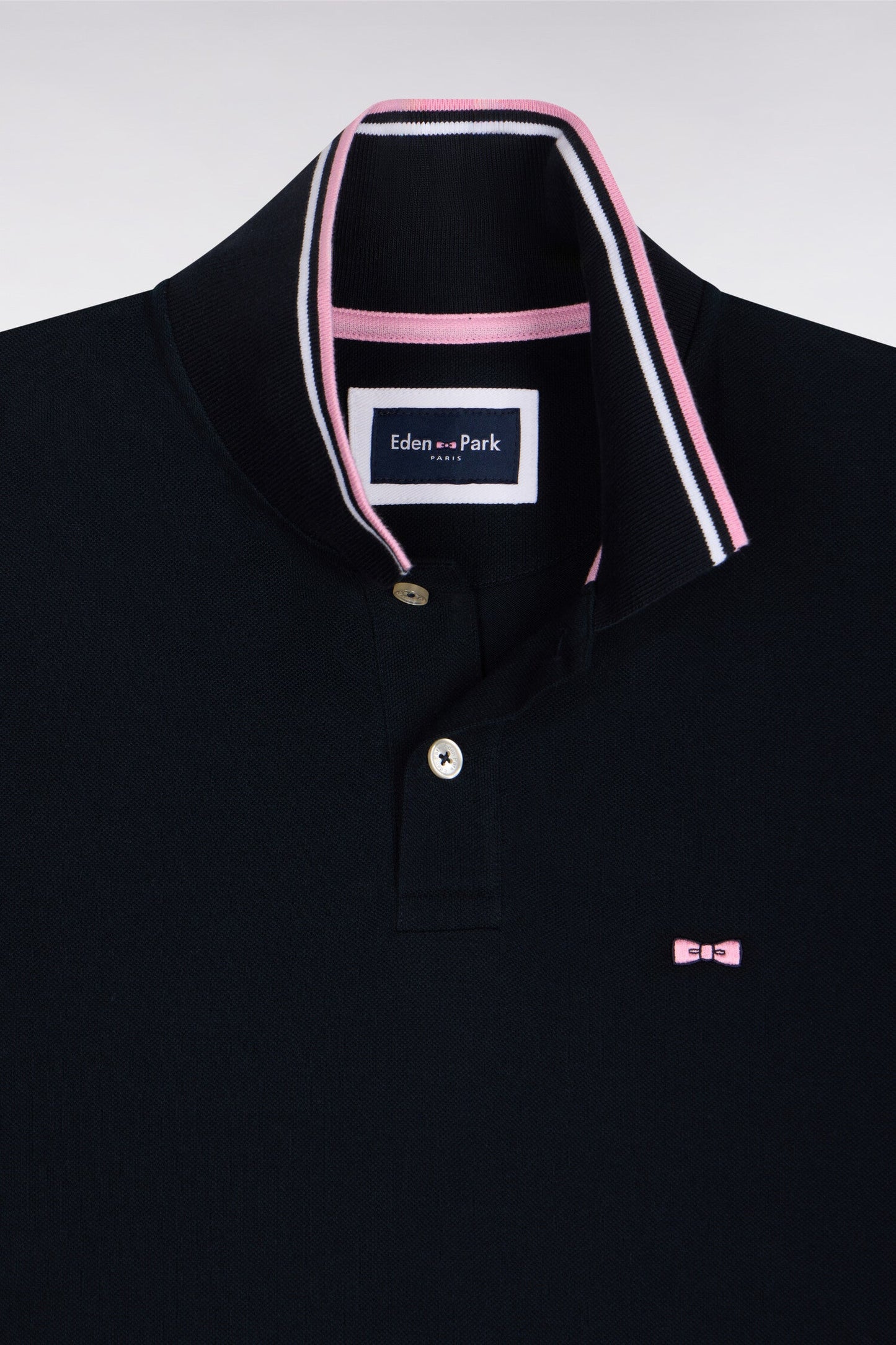 Polo manches courtes en coton marine détails rayés coupe regular