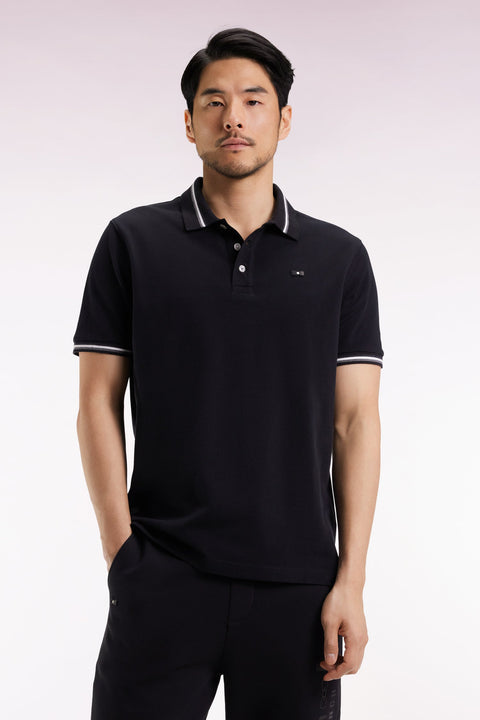 Polo manches courtes en coton noir détails rayés coupe ample - Image 1