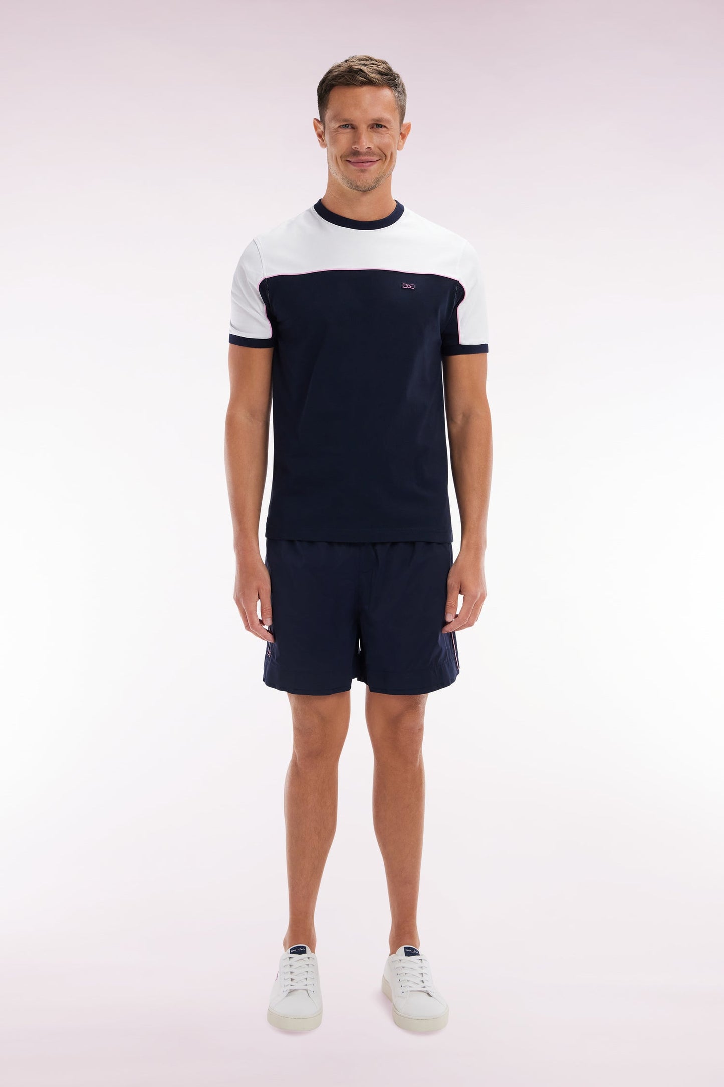 Maillot de bain marine à passepoil rose