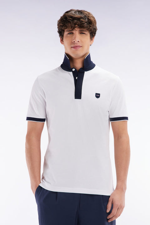 Polo uni à manches courtes en coton stretch blanc passepoil contrasté coupe ajustée - Image 1