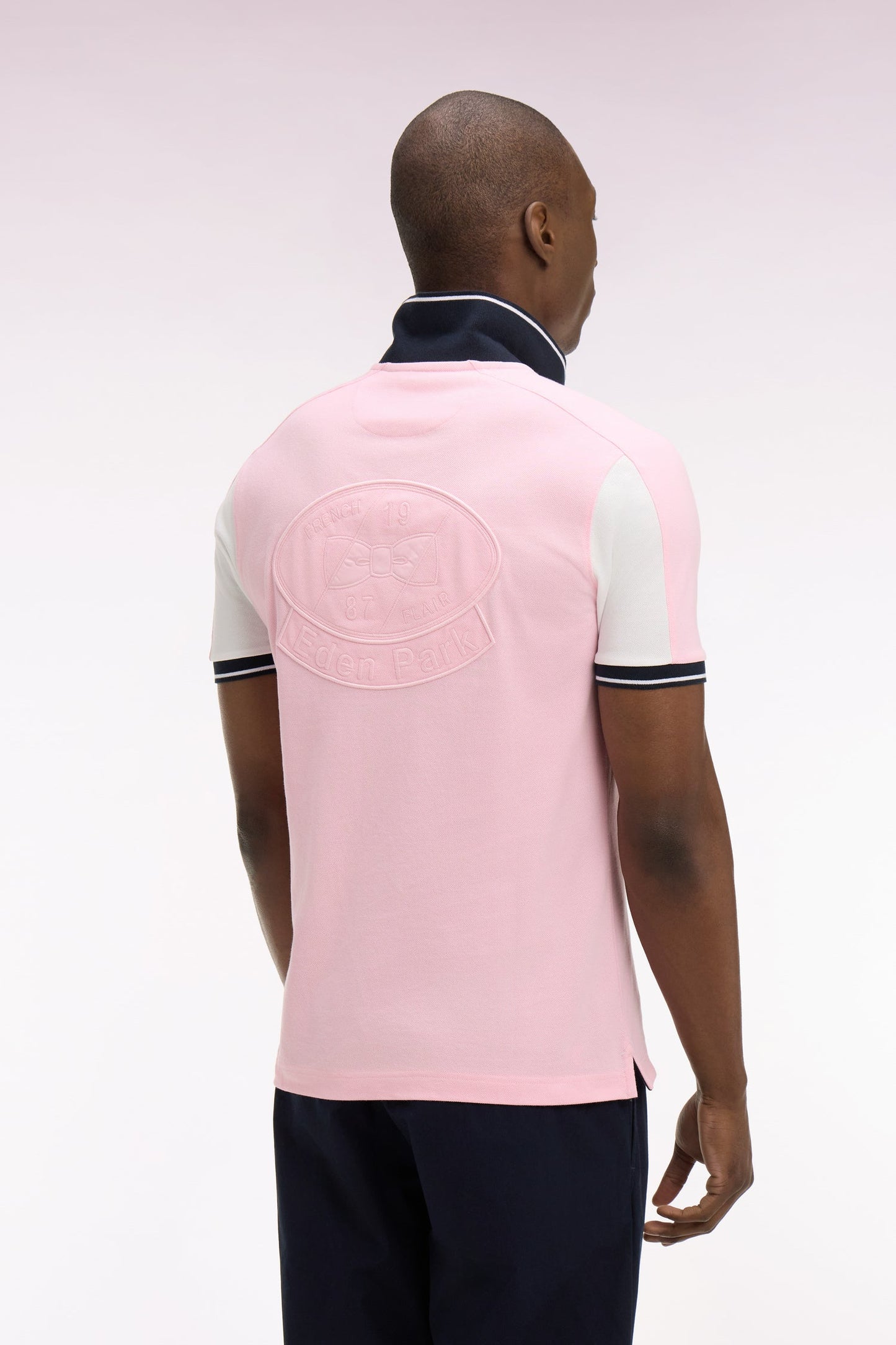 Polo à manches courtes en coton rose brodé coupe regular