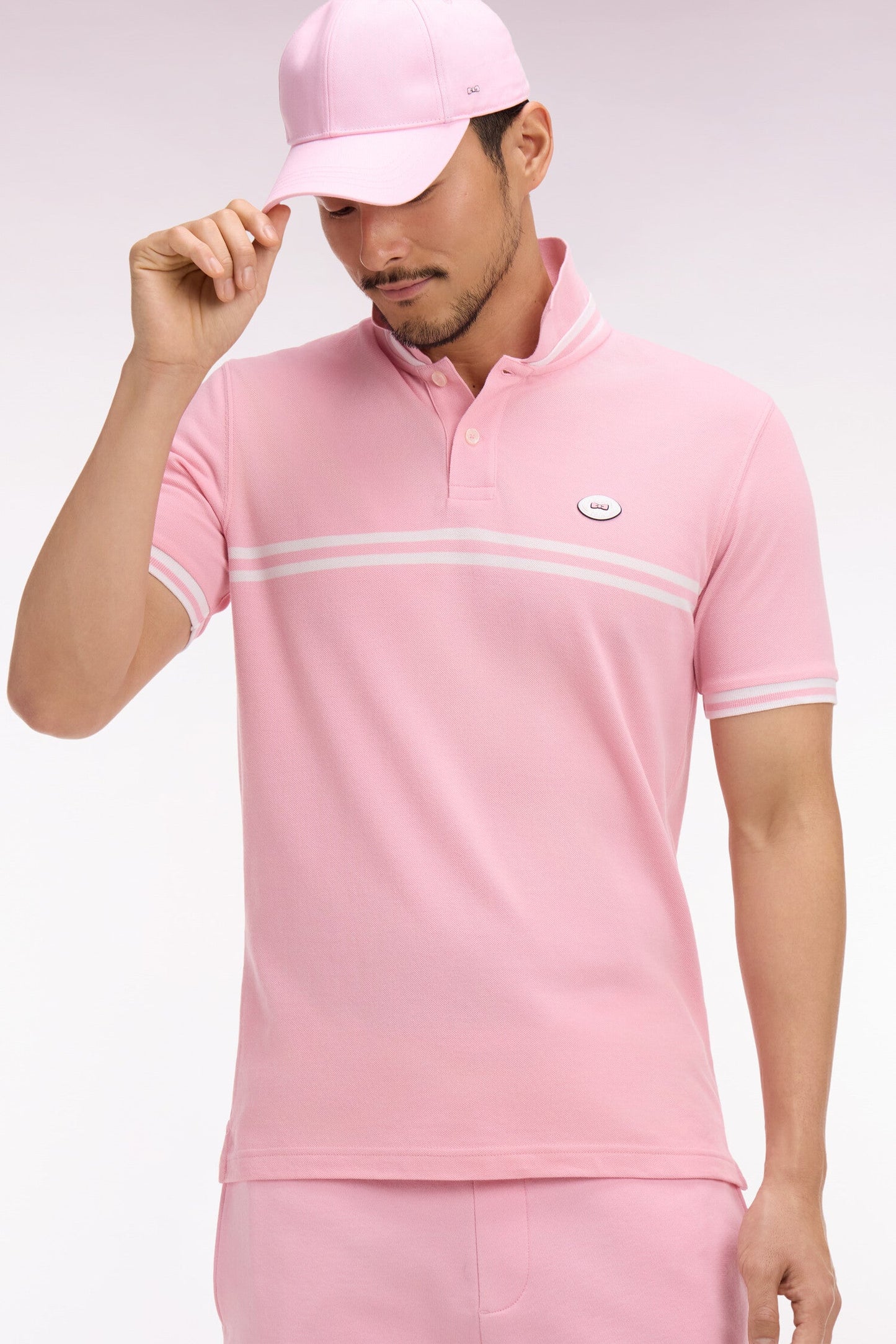 Polo à manches courtes en coton rose à rayures blanches coupe regular