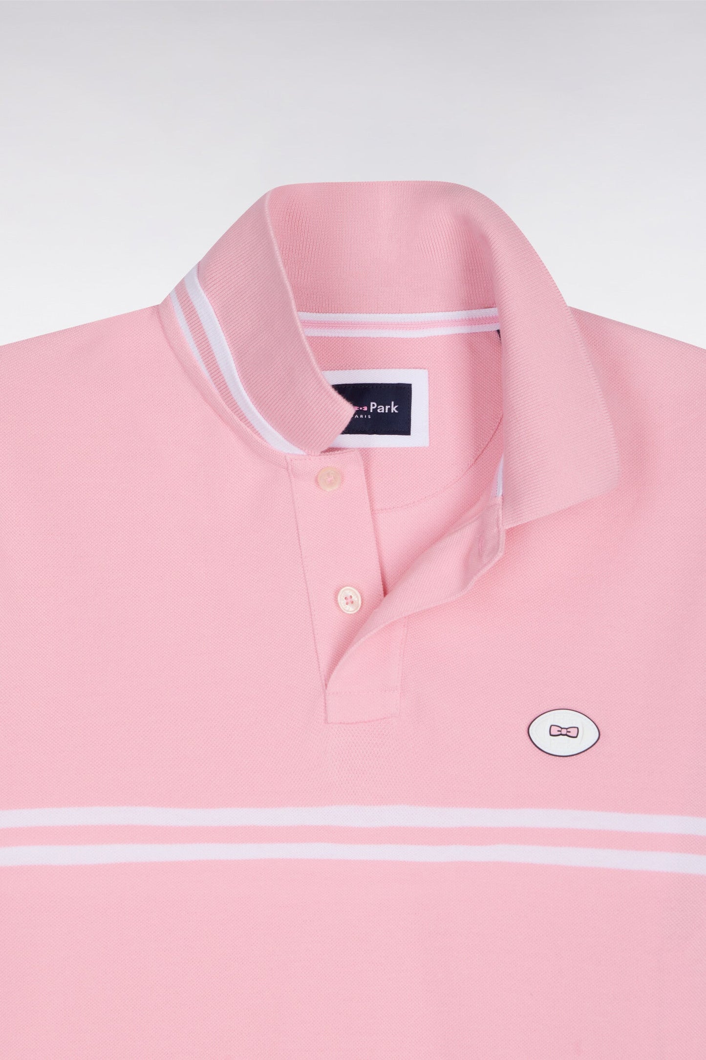 Polo à manches courtes en coton rose à rayures blanches coupe regular
