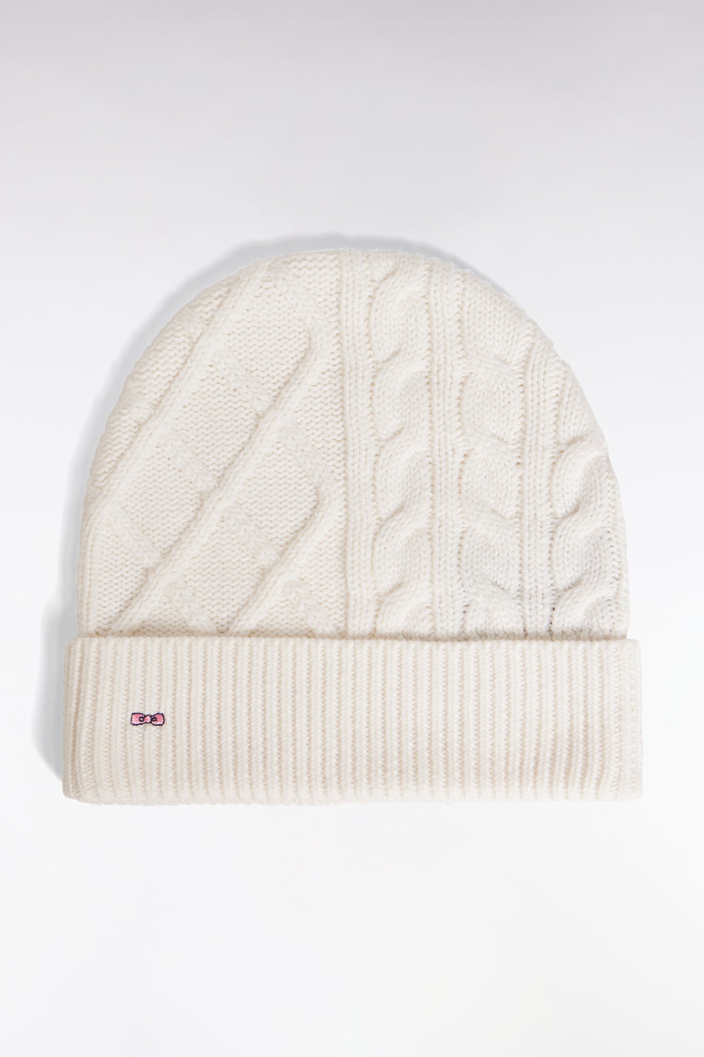 Bonnet à torsades en laine et coton blanc