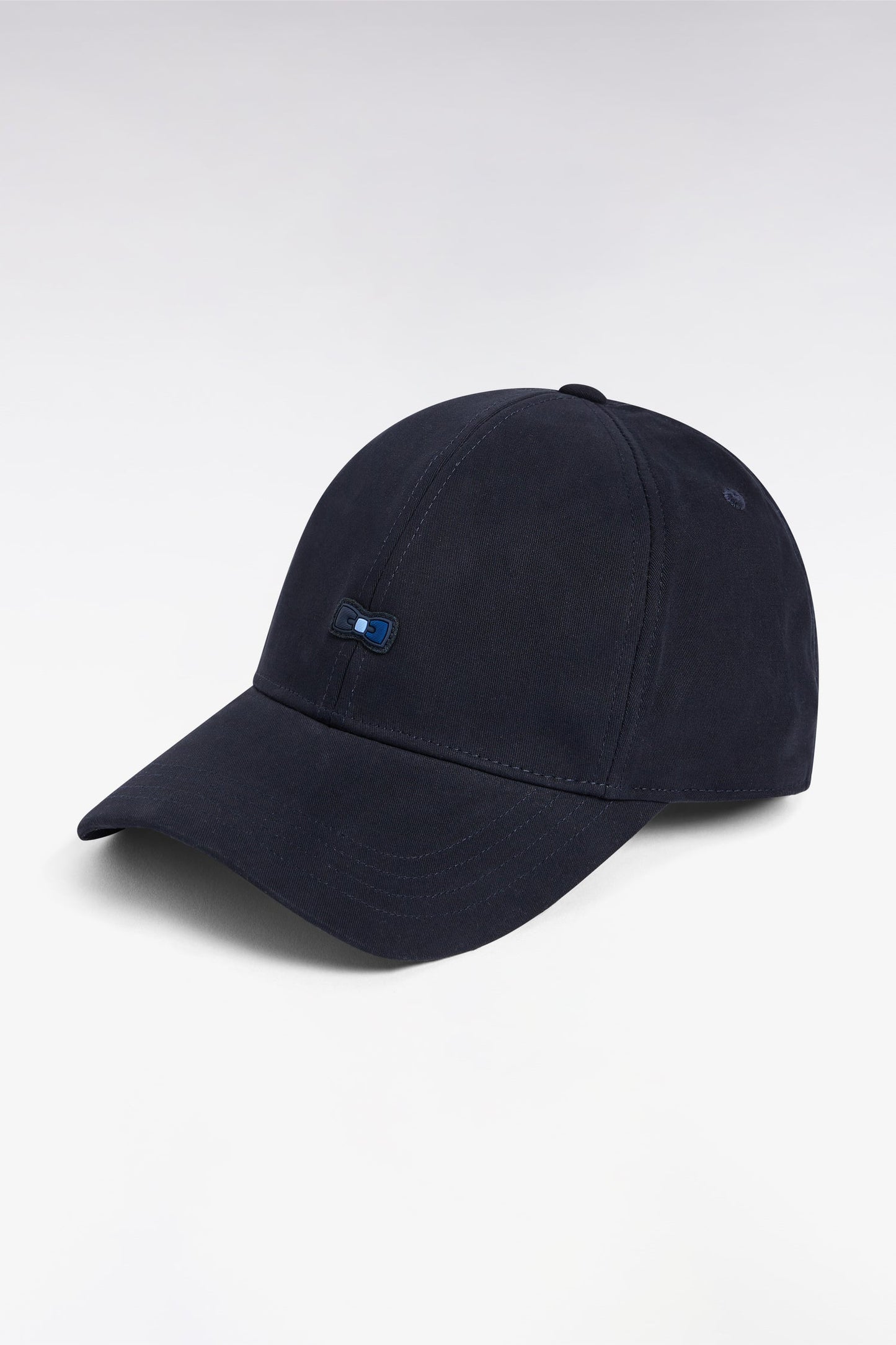 Casquette en piqué coton marine nœud papillon tricolore