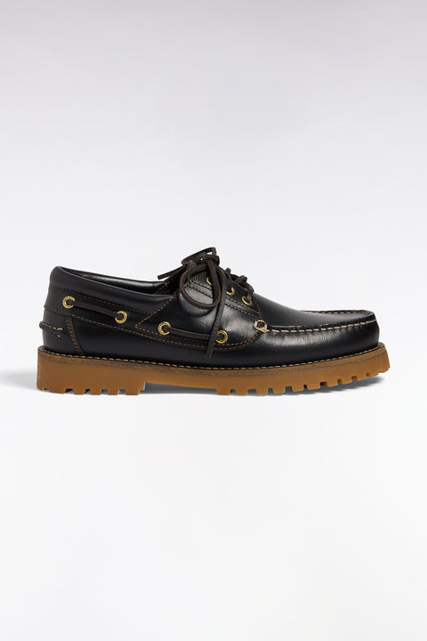 Chaussures bateau en cuir lisse noir semelles beige - Image 1