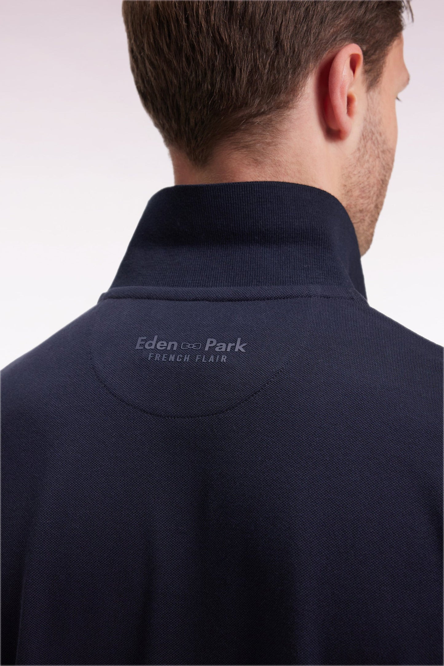 Polo manches courtes en coton marine détails rayés coupe ample