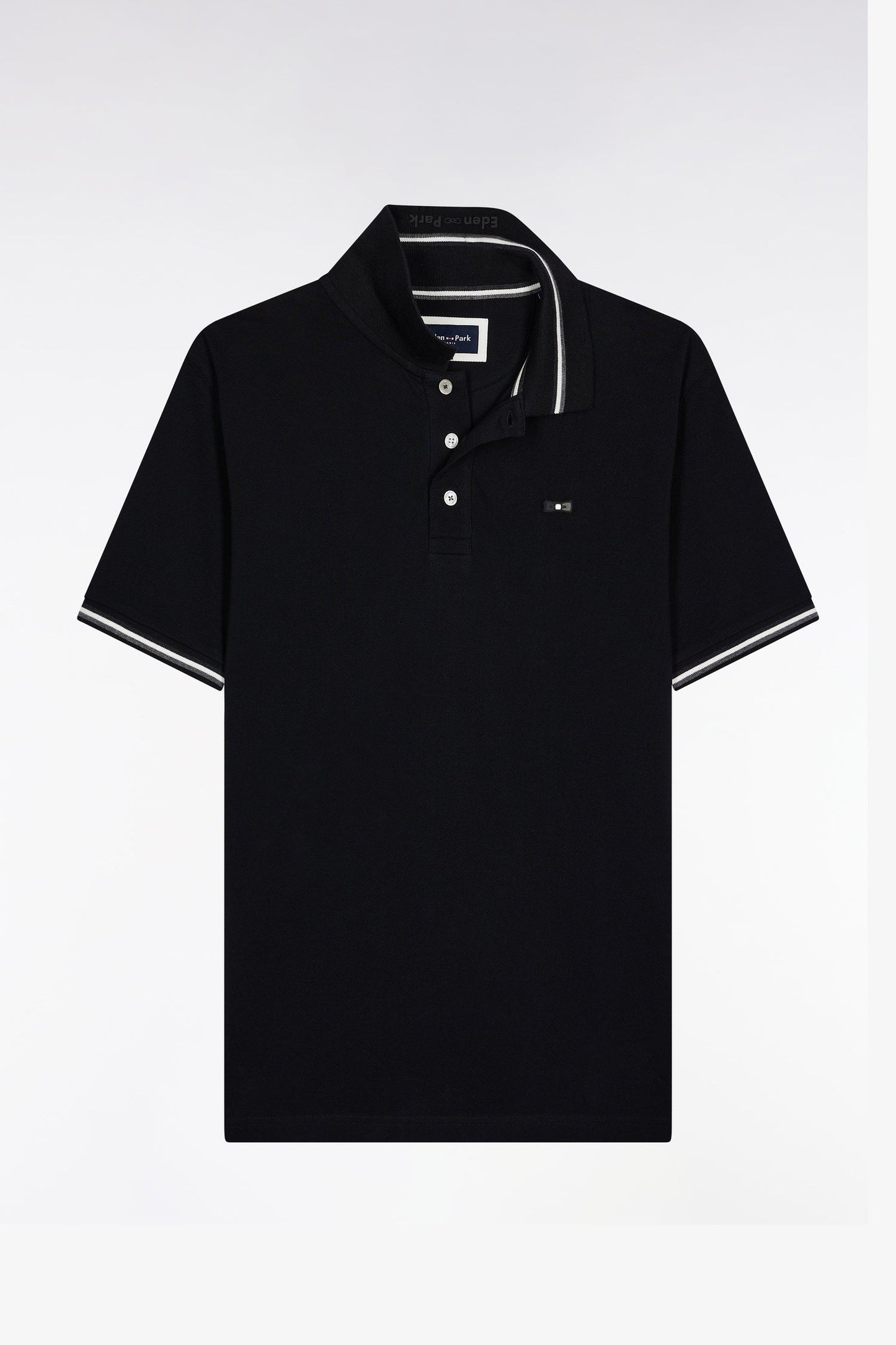 Polo manches courtes en coton noir détails rayés coupe ample