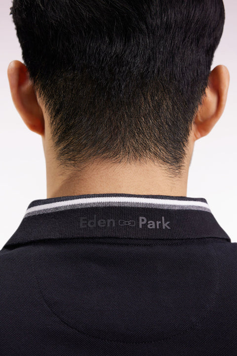 Polo manches courtes en coton noir détails rayés coupe ample - Image 3