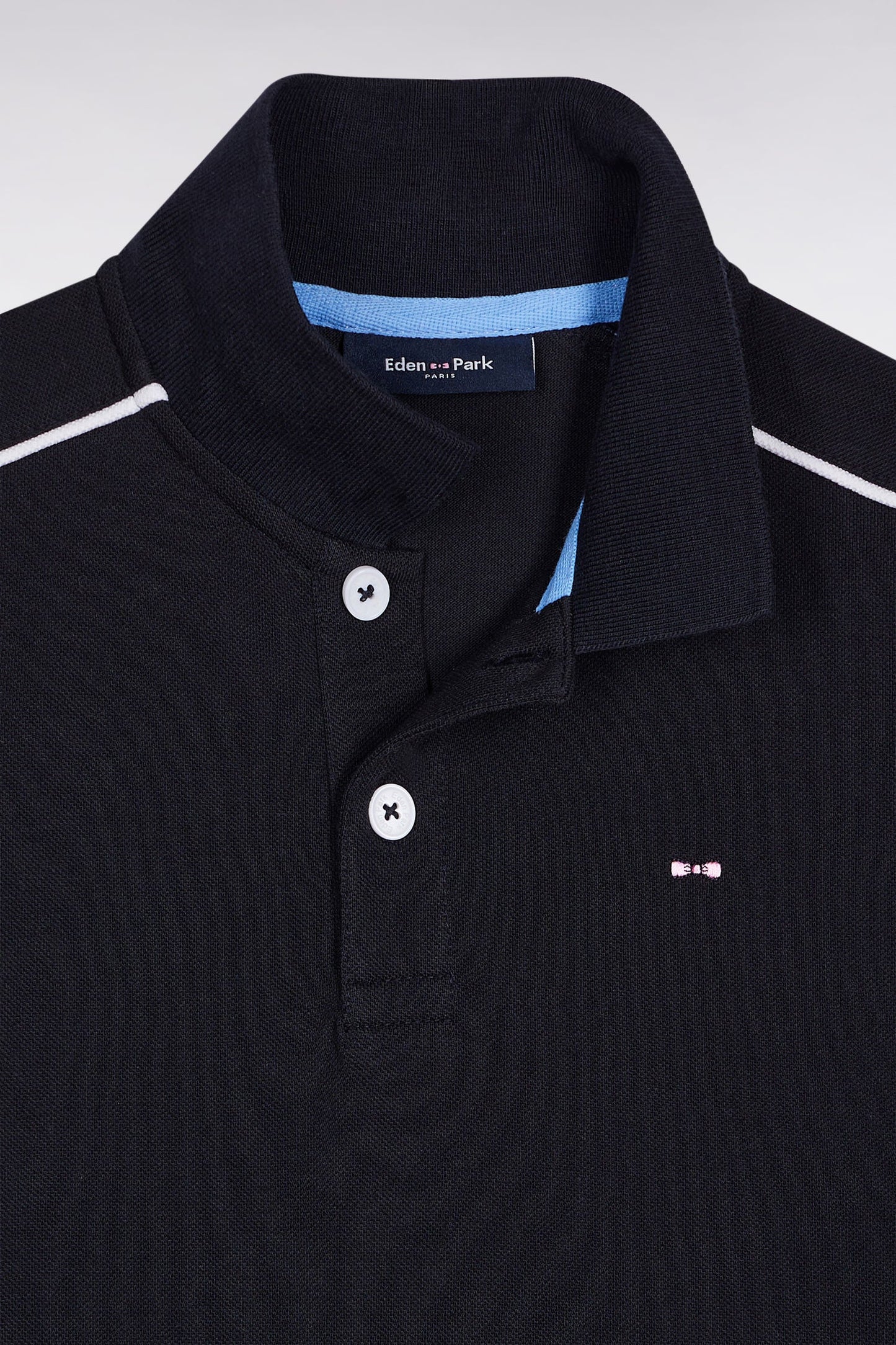 Polo manches courtes en coton marine passepoils blancs coupe droite