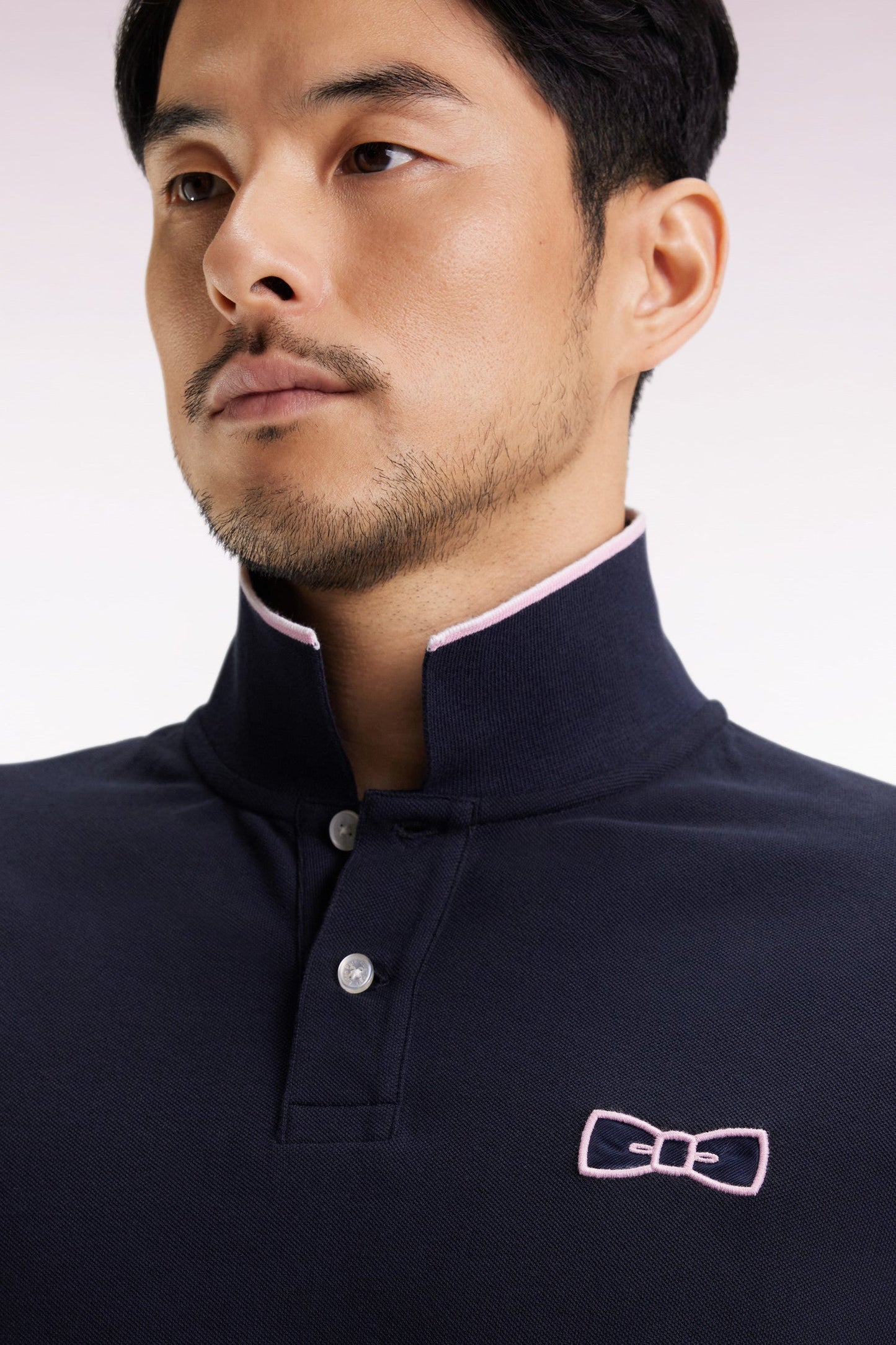 Polo manches courtes roses en piqué coton marine coupe droite