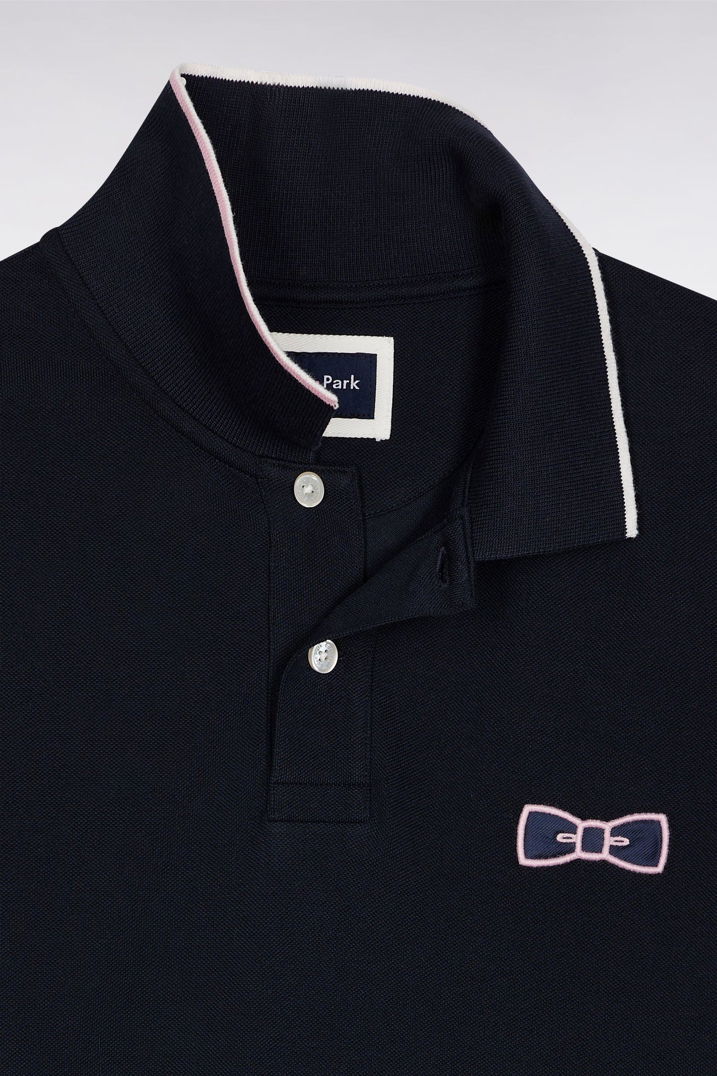 Polo manches courtes roses en piqué coton marine coupe droite