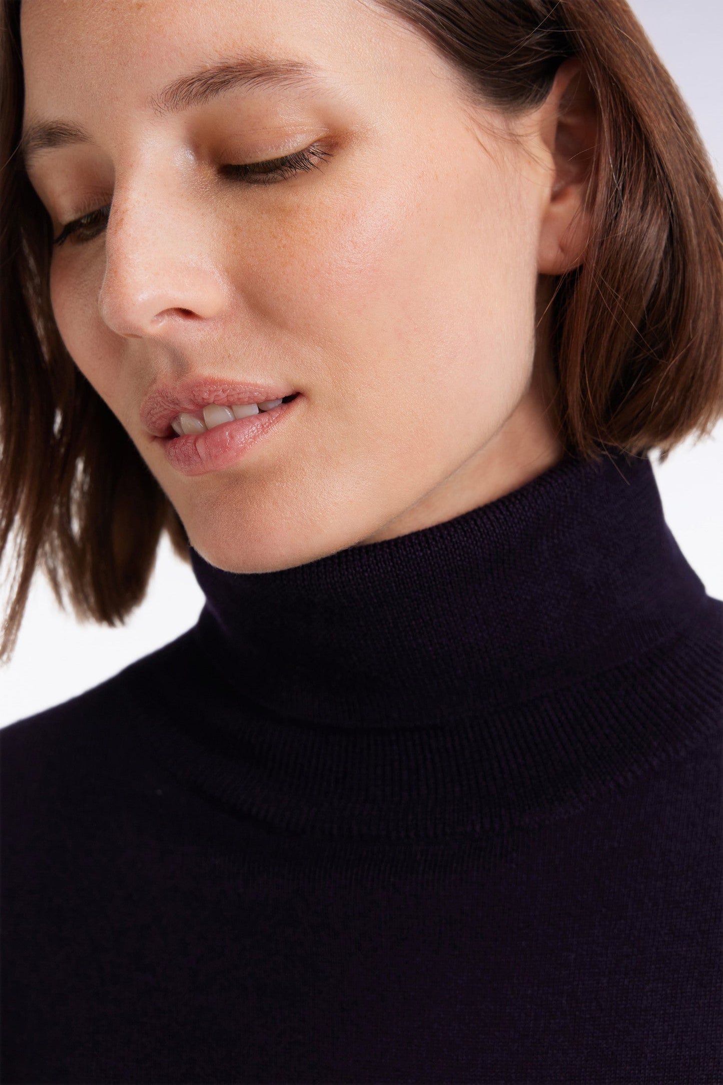 Pull à col roulé en laine mérinos marine