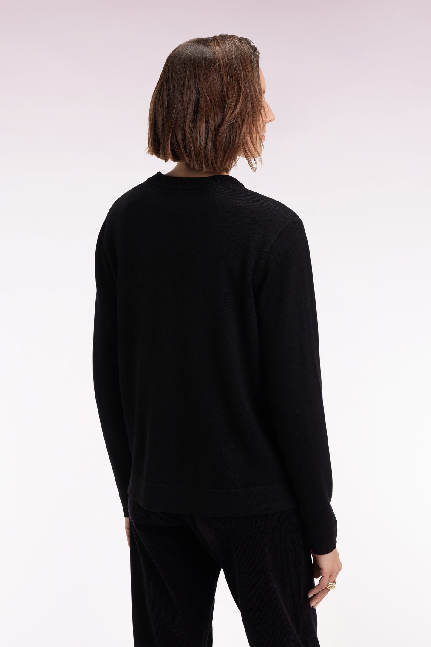 Pull à col rond en laine mérinos noir
