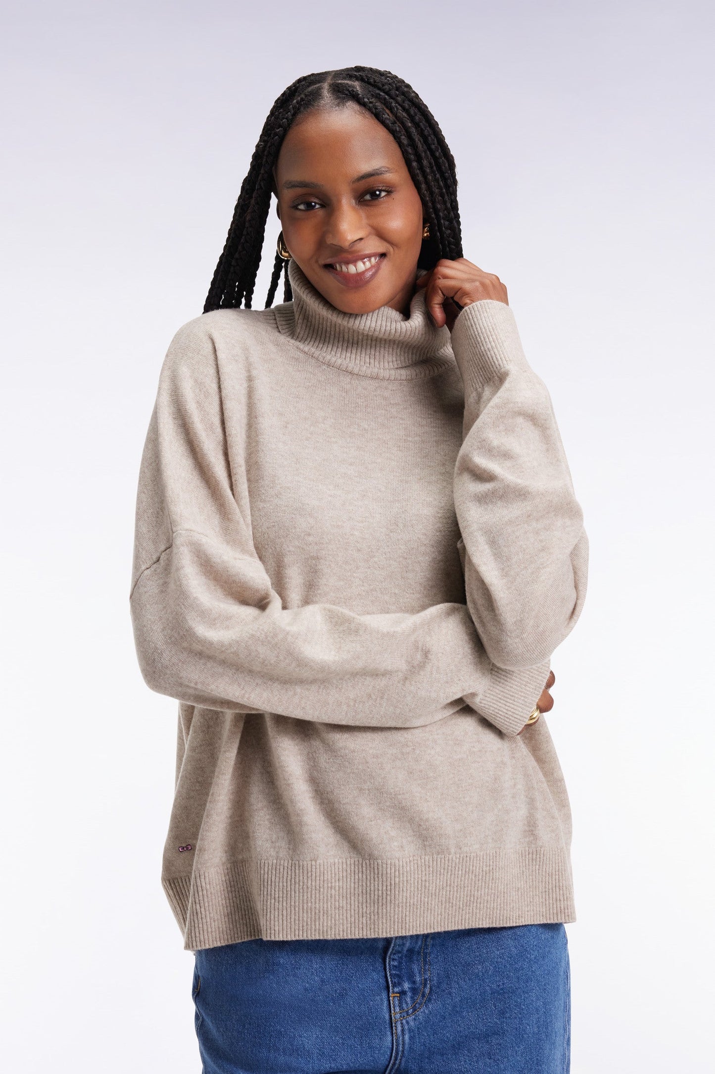 Pull à col roulé en laine et cachemire beige coupe Relaxed