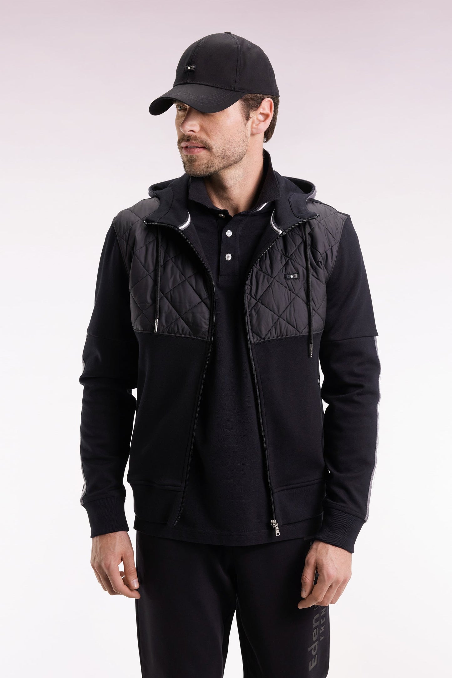 Sweatshirt zippé en interlock bimatière matelassé noir et gris